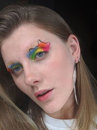 Close-up portrait of young woman with make-up