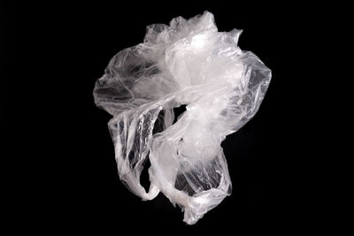 Close-up of ice cream over black background