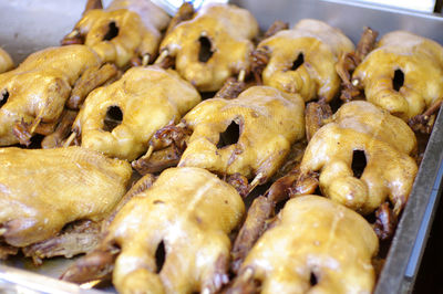 Boiled soy sauce duck in tray at wet market asia