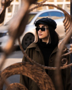 Portrait of young woman wearing sunglasses