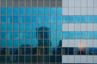 Low angle view of modern glass window