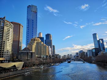 Modern buildings against sky in city