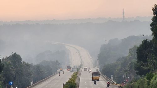 High angle view of road against sky during sunset