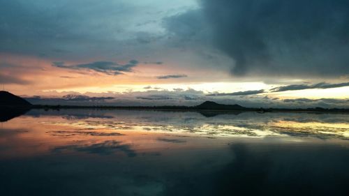 Scenic view of sea against cloudy sky