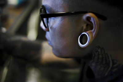 Side view of young man looking away