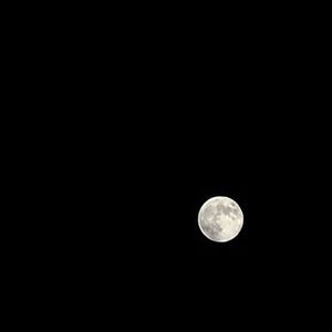 Low angle view of moon in sky