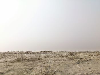 Scenic view of desert against clear sky