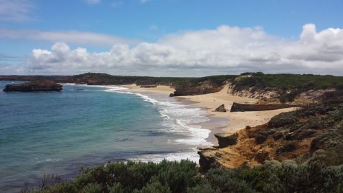 View of calm beach against the sky