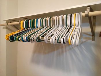 Coathangers hanging on rack