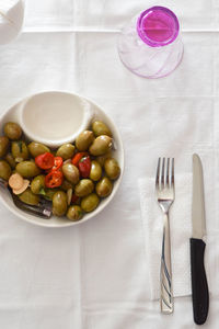 High angle view of candies in bowl on table