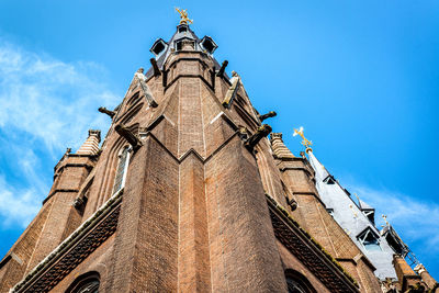 Low angle view of cathedral against blue sky