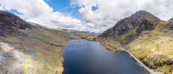 Panoramic view of lake and mountains against sky