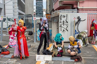 Group of people at street in city