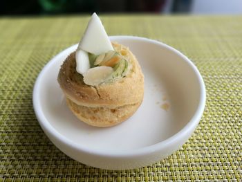 Close-up of bread in plate on table
