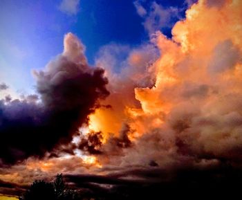 Low angle view of dramatic sky during sunset