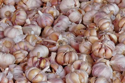 Full frame shot of onions for sale in market