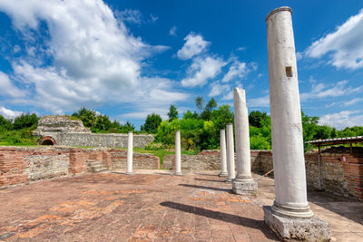 View of historical building against cloudy sky