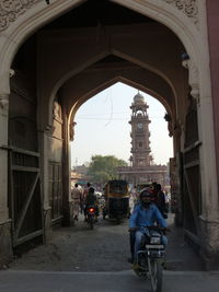 People walking on road in city