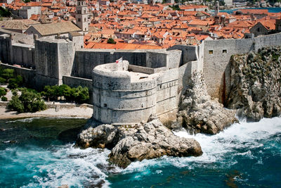 View of buildings in water