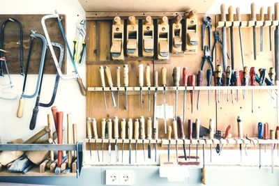 Tools on rack at workshop