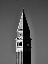 Low angle view of clock tower against sky