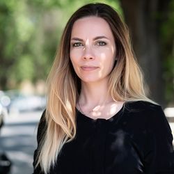 Portrait of woman standing outdoors