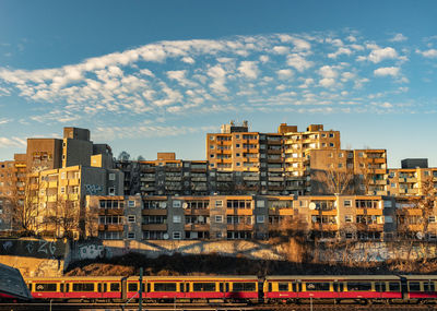 Buildings in city against sky