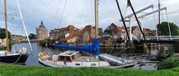 Sailing ships moored in the port of the ancient dutch city of enkhuizen