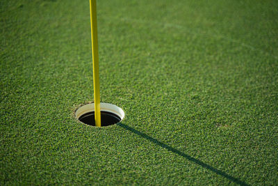 High angle view of golf ball on field