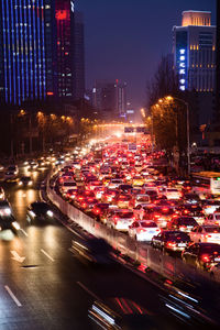 Traffic on road in city at night