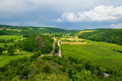 View of the chain of auvergne volcanoes under a thunderstorm