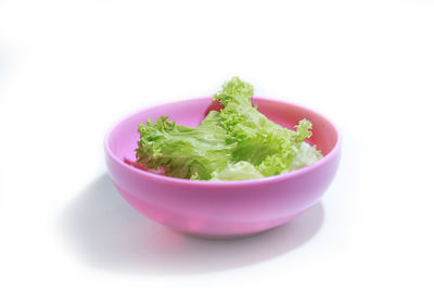 Close-up of salad in bowl against white background