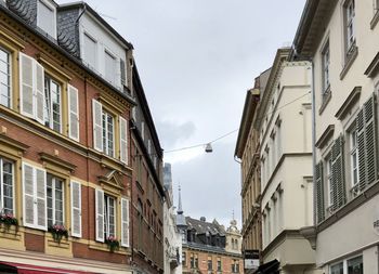 Low angle view of buildings against sky