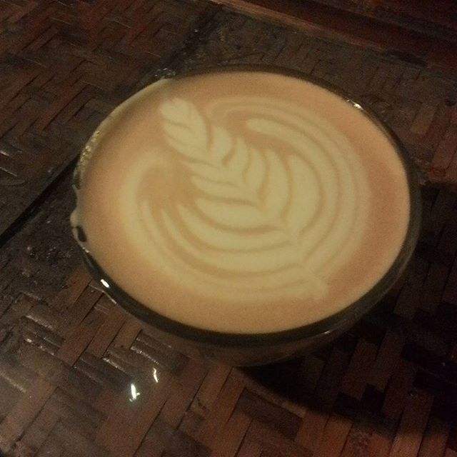 indoors, table, coffee cup, high angle view, drink, coffee - drink, food and drink, refreshment, saucer, froth art, design, still life, directly above, cappuccino, frothy drink, wood - material, art, no people, creativity, pattern