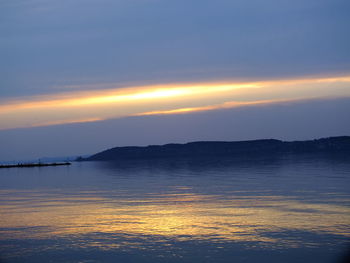 Scenic view of sea at sunset