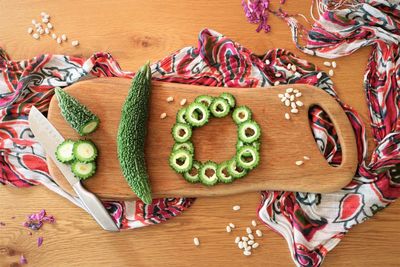 High angle view of goya bitter gourd vegetables on table