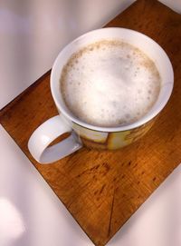 High angle view of cappuccino on table