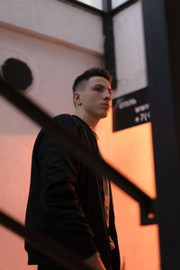 Portrait of young man looking away