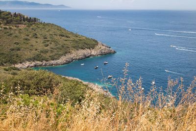 High angle view of bay against clear sky