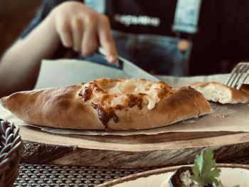 Close-up of hand holding bread