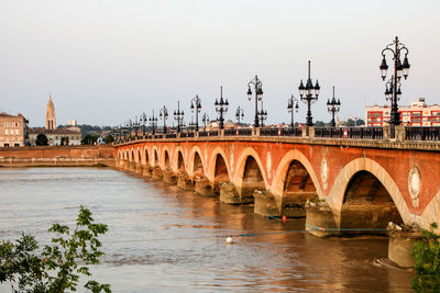 Arch bridge over river