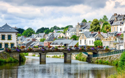 River, bridge and colourful ancient houses. josselin, beautiful village of french brittany