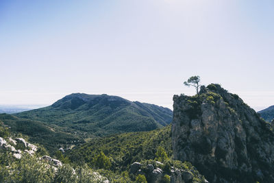 Scenic view of rocky mountains against clear sky