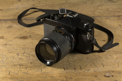 High angle view of camera on table