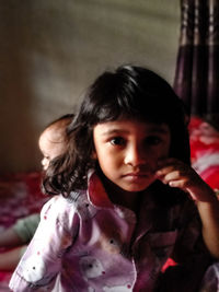 Portrait of cute girl at home
