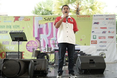 Portrait of man standing with text