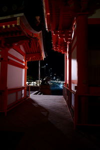 Empty corridor of building at night