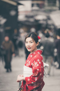 Portrait of smiling young woman