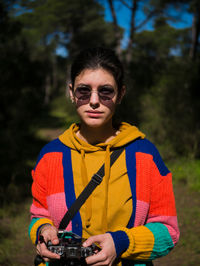 Portrait of smiling young man wearing sunglasses