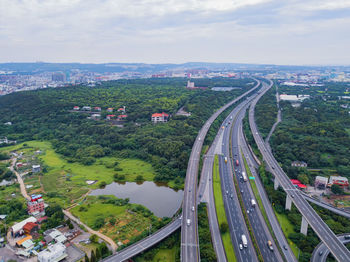 High angle view of road amidst buildings in city